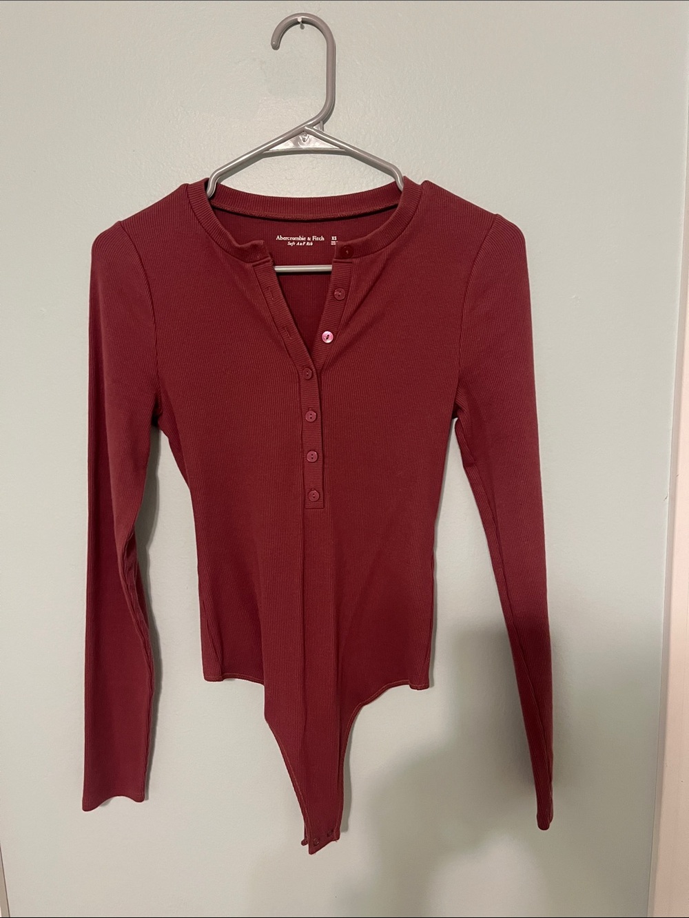 Abercrombie & Fitch Long-Sleeve Ribbed Henley Bodysuit in Wine